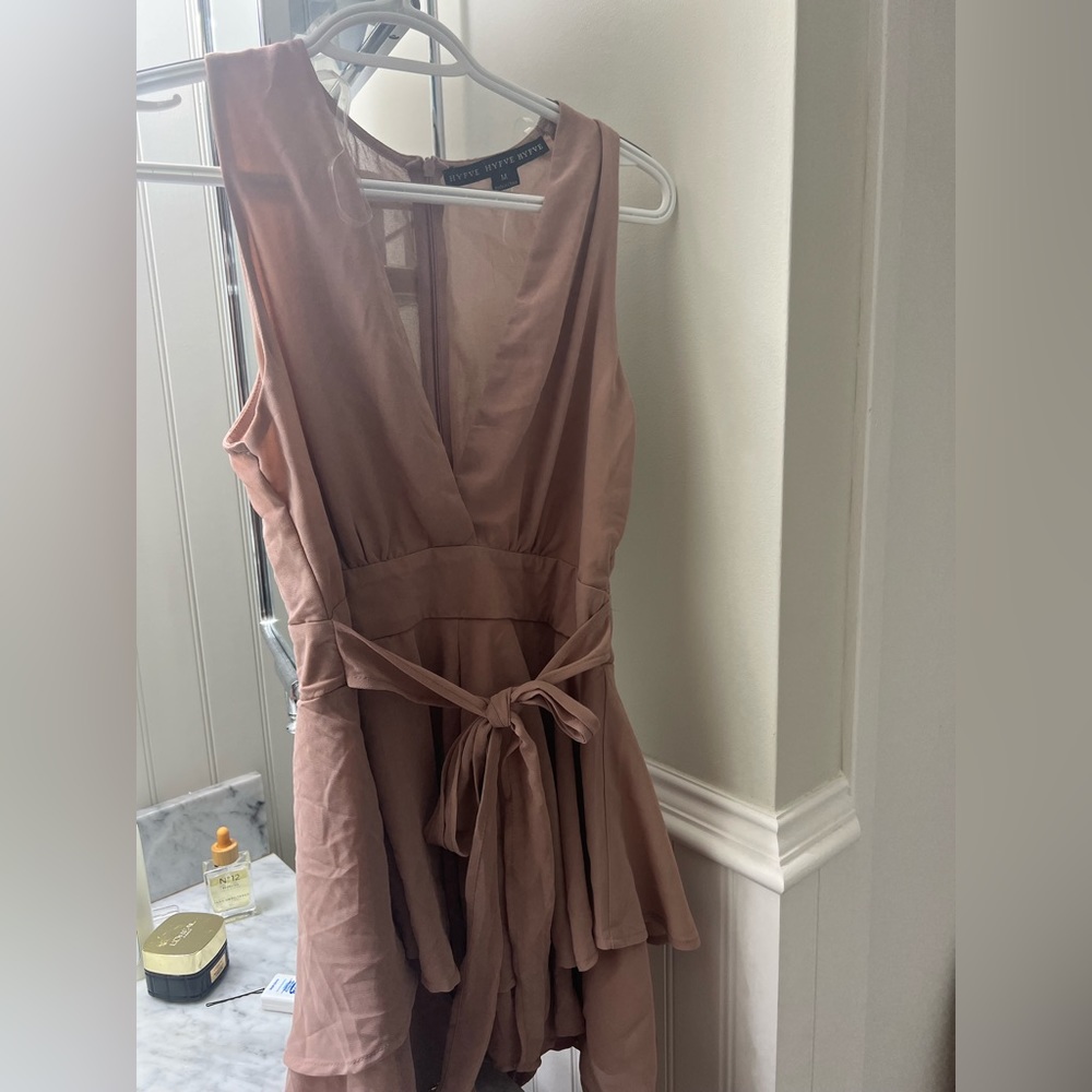 Front tie romper. Back zipper NWOT
